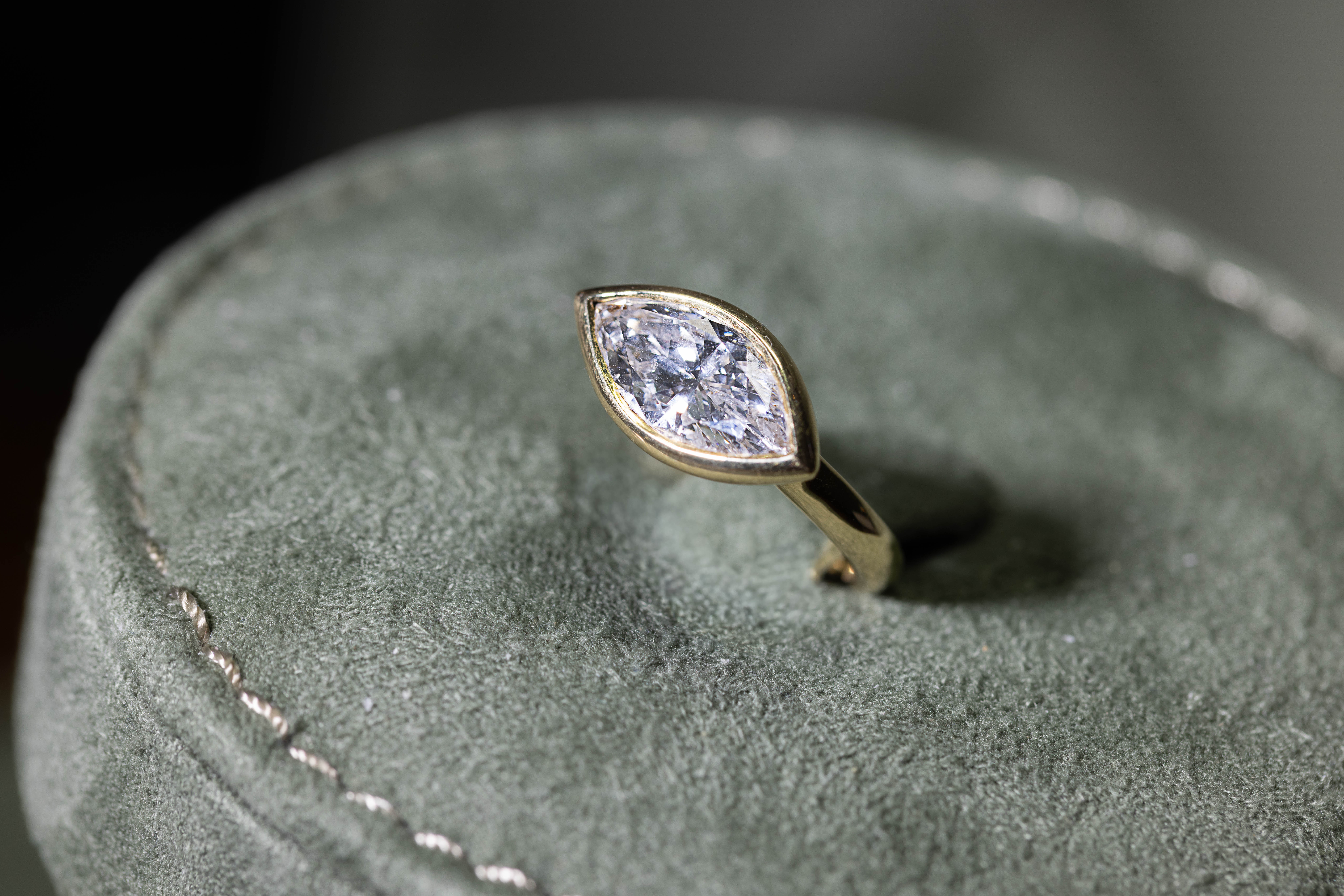 Statement ring displayed on a jewellery cushion